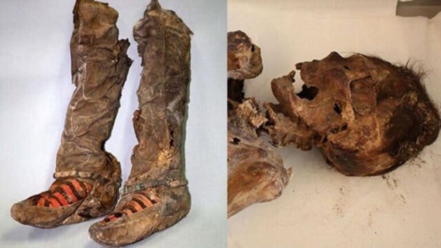 mummia con scarpe da tennis